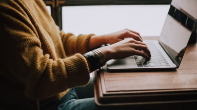 Someone using a laptop
